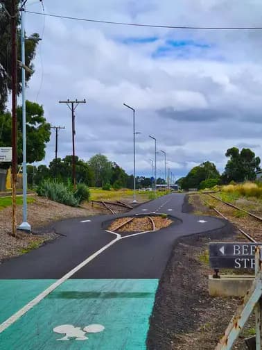 Lighting poles secured using adjustable steel foundation footings