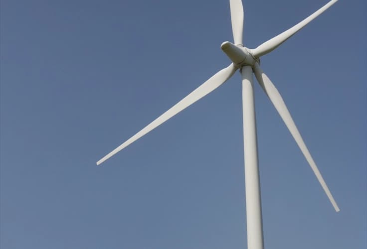 Steel footing system supporting a small wind turbine