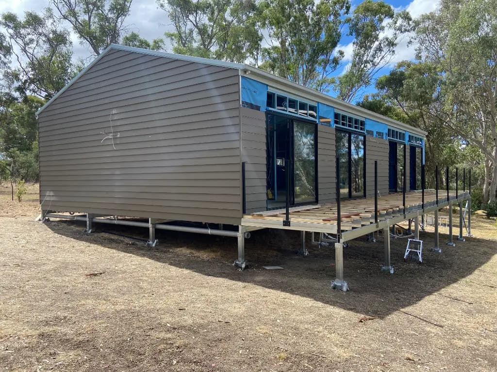 Adjustable footings in place for modular home installation