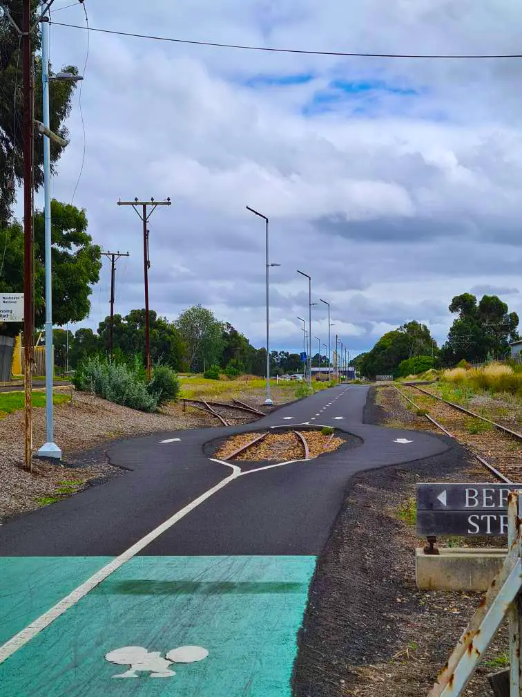 Lighting poles secured using adjustable steel foundation footings