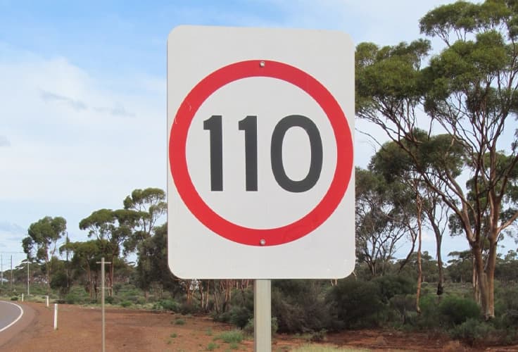 Steel footing system supporting a roadside sign